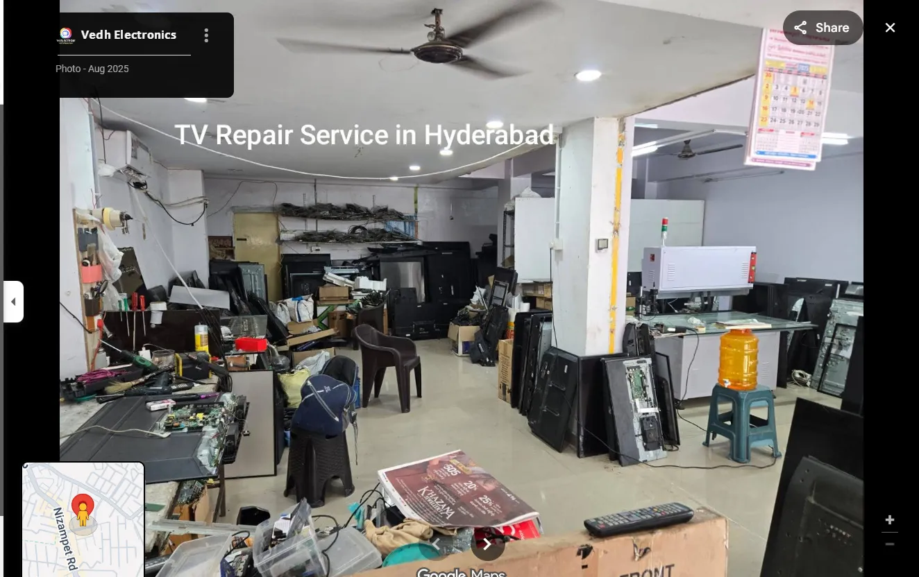 Workbenches and televisions inside the workshop
