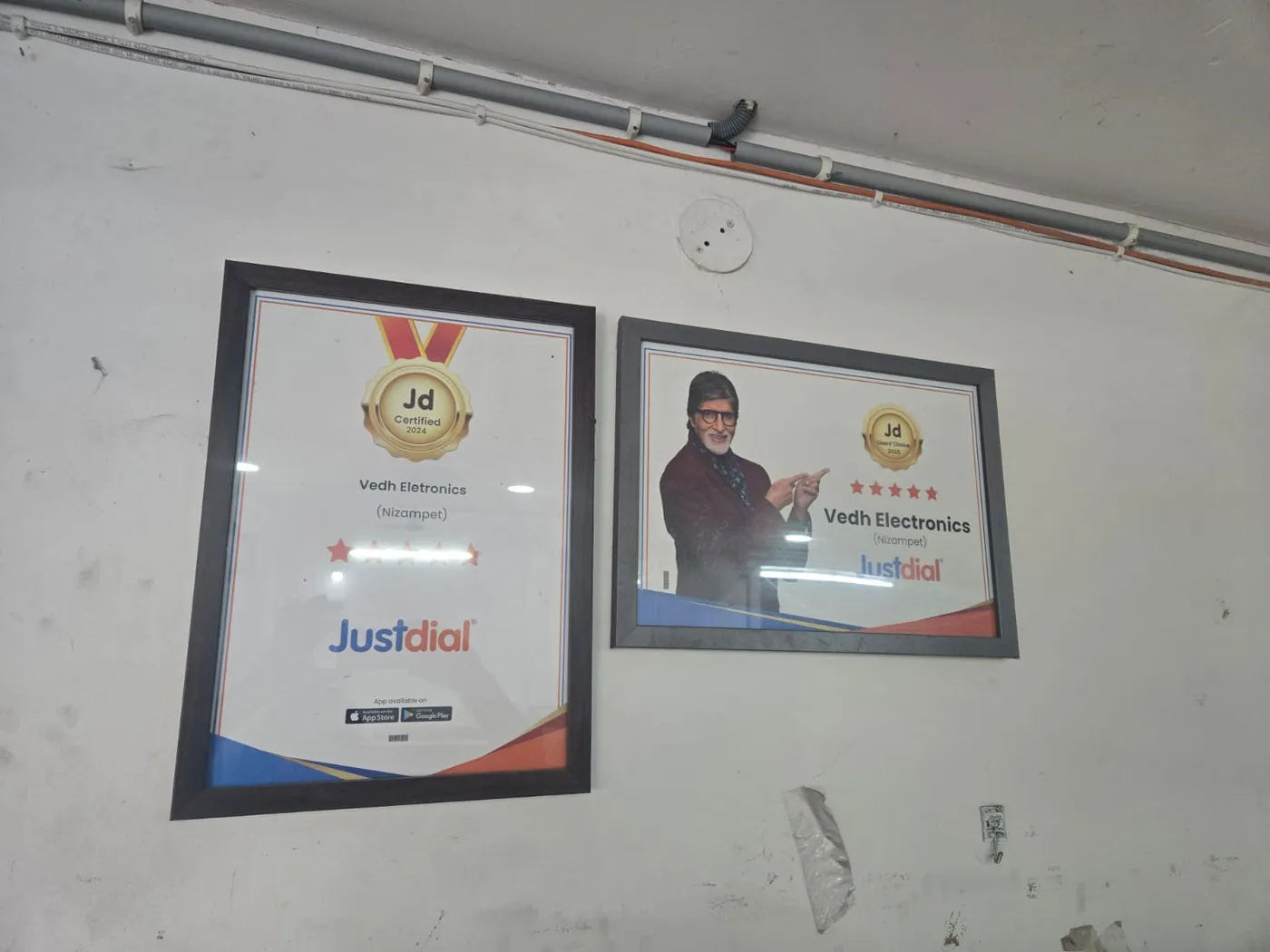 Framed displays on the workshop wall